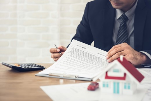 real estate lawyer reviewing contracts